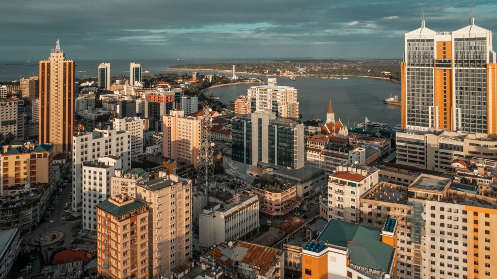 view of dar es salaam, tanzania, showing a vibrant cityscape with tall buildings