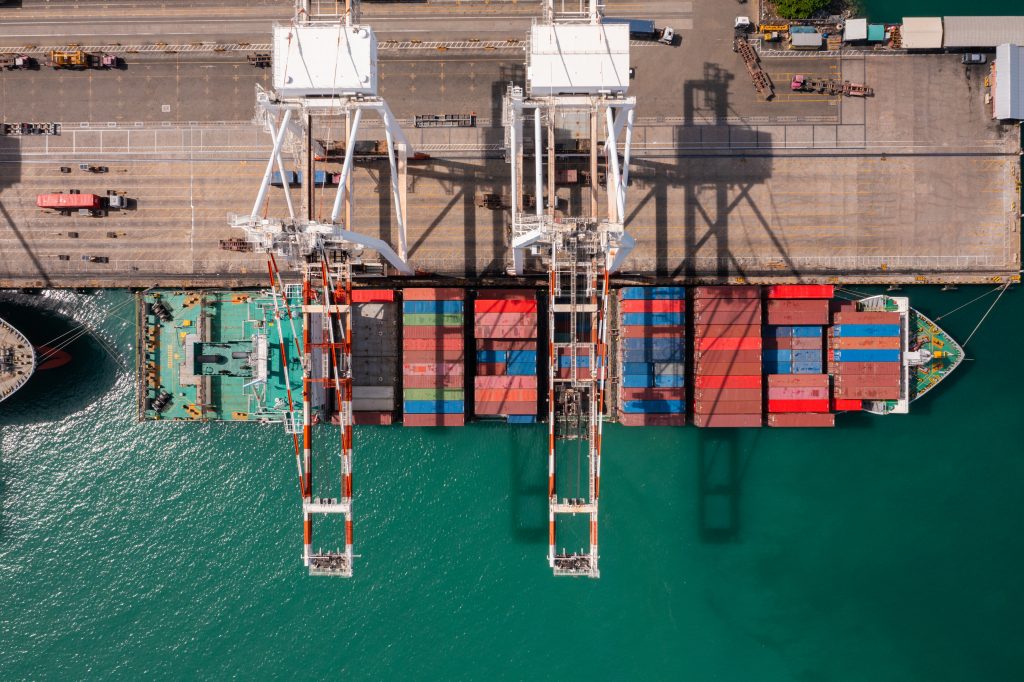 aerial view of cargo ship at dock
